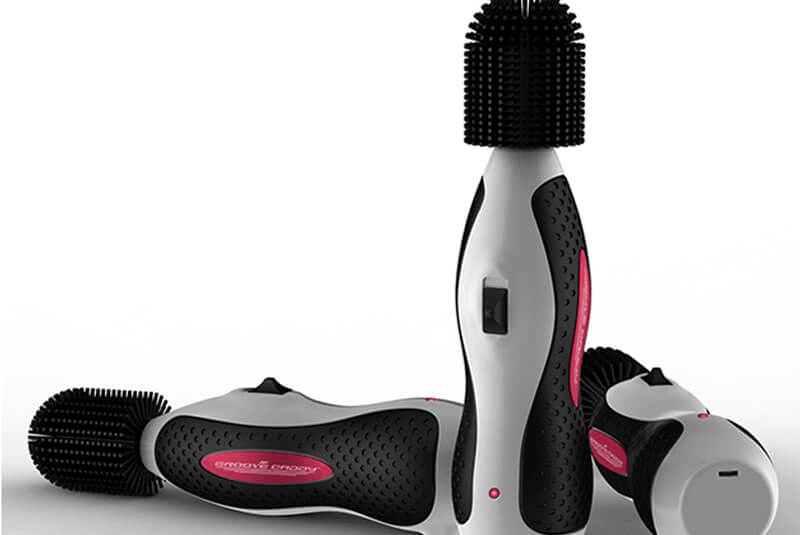 Three Groove Groom battery-powered golf club cleaners in black, white and pink